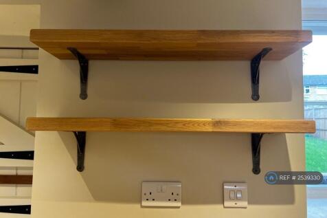 Oak Shelves With Iron Brackets
