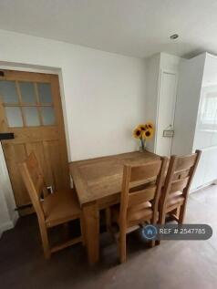 Kitchen And Door Leading To Garage