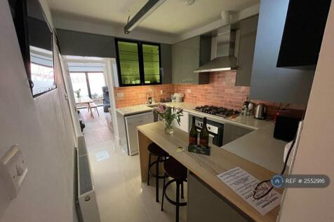 Kitchen Area With Under Stairs Toilet