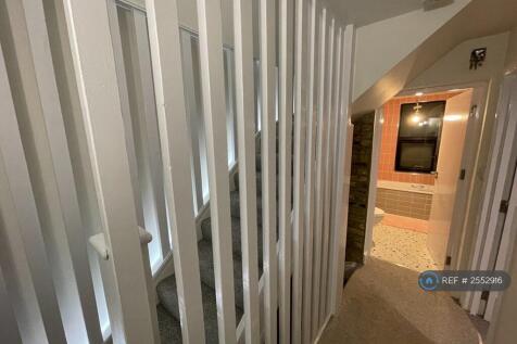 Hallway Leading To Bathroom 