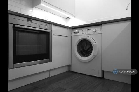 The Kitchen Has a Slide-&amp;-Hide Oven, ...