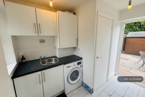 Utility Room With Door To Downstairs Toilet