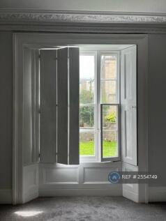 Sitting Room Showing Shutters And Coving