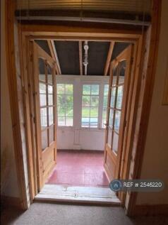 Bedroom French Doors Leading To Sunroom