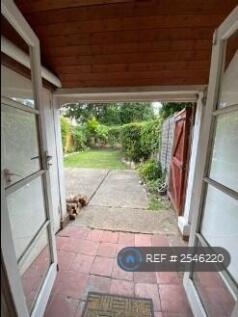 Back Porch Leading To Sunroom And Patio/Garden