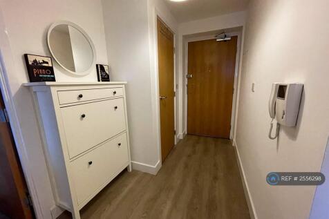 Shoe Cabinet Installed To Keep Hallways Clear