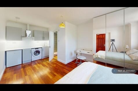 Studio With Triple Door Mirror Wardrobe