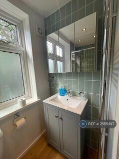 Basin In Bathroom With Mirror Cabiinet