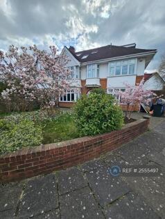 Front Of House With Gardens