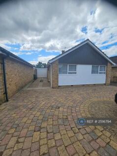 Front Of House With Drive And Garage