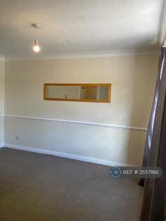 Lounge Facing Wall And Mirror