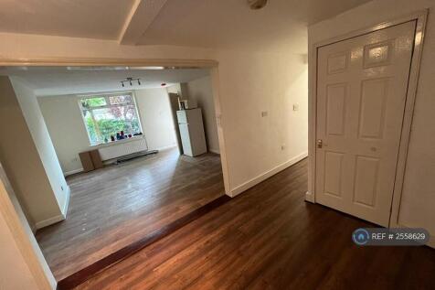 Living Room And Passage To Bedrooms