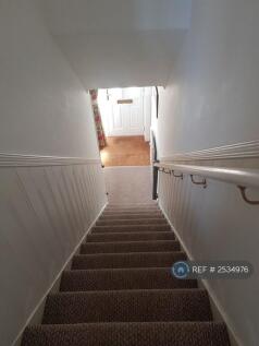 Stairs Looking Down To Front Door