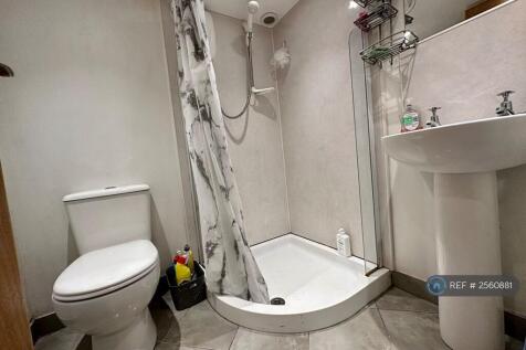 One Of The Two Bathrooms 
