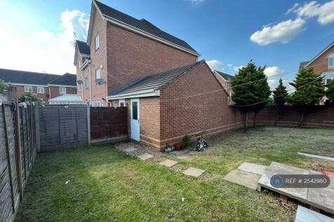 Backyard With Garage Door
