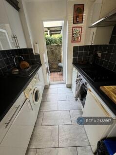 Kitchen/ Door Leading To Garden