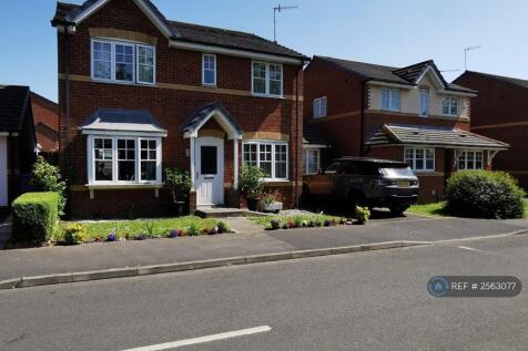 Front Of House With Lovely Gardens