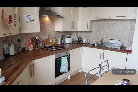 Kitchen Area With Oven And Washing Machine 