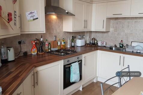Kitchen Area With Oven And Washing Machine 