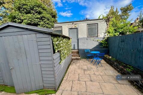 Ground View Of Garage And Bike Shed