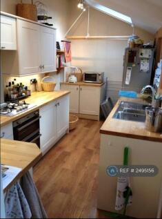 Kitchen With Door To Back Yard