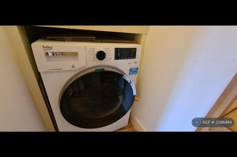 Washing Machine In Cupboard
