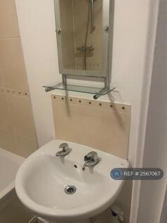 Basin Under Mirror