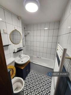 Bathroom With Shower Over Bath