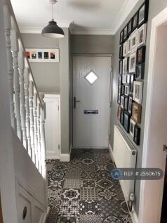 Entrance Hallway And Stairs With Storage