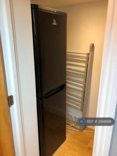 Walk In Cupboard With Fridge/Freezer