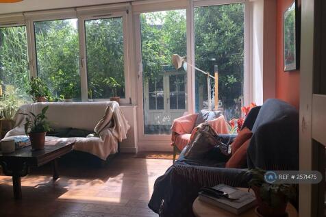 Sliding Doors Out To Garden And Cabin
