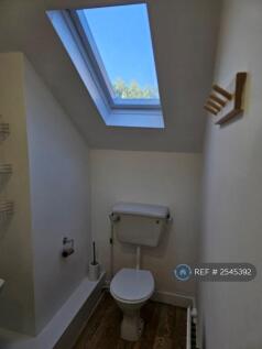 Bathroom With Bath And Overhead Shower