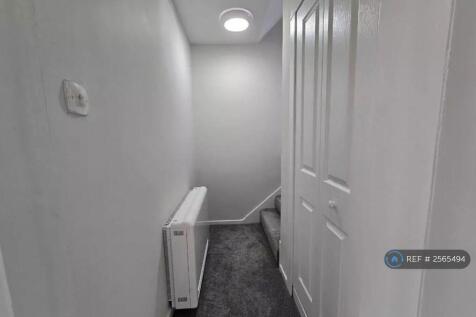 Lower Hall And Storage Cupboard 
