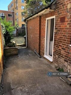 Rear Of House Leading To Garden