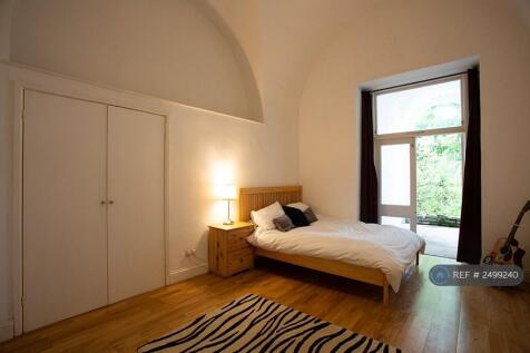 Bedroom 1 - Patio Doors Onto Veranda