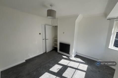 Bedroom With Built-In Closet