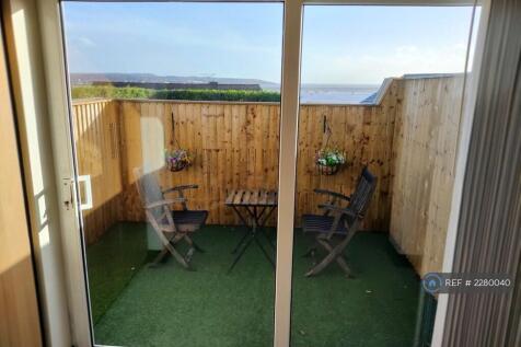 Outside Patio Space With Seating &amp; Table 