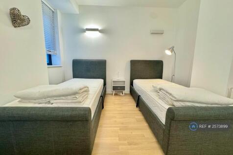 Bedroom 2: With Two Single Ottoman Storage Beds
