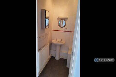 Tiled Bathroom, White Wash Basin With Light Above