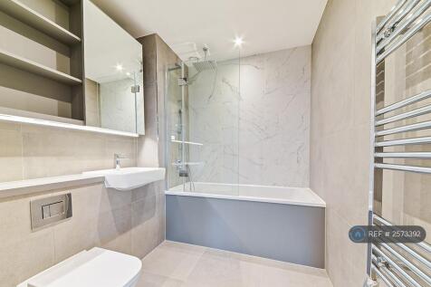 Modern Bathroom With Bathtub And Overhead Shower