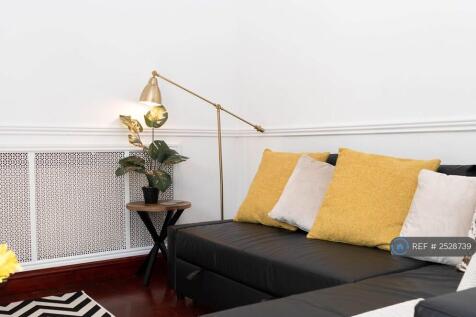 Living Room With a Double Sofa Bed