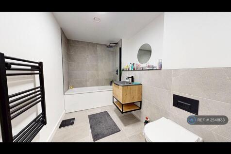 Spacious Main Bathroom With Bath