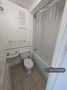Bathroom, Bath And Electric Shower
