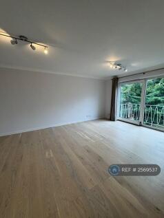 Living Room And Balcony, Overlooking The Park