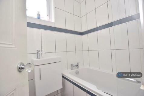 Family Bathroom With Shower In Bath