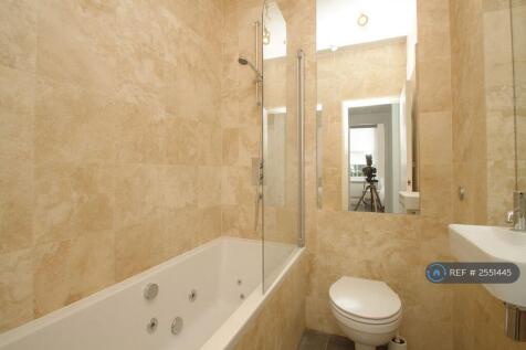 Spa Bath With Shower Over