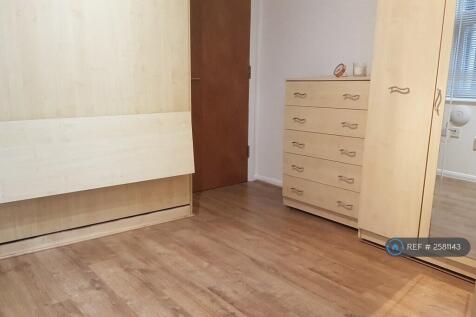 Living Space w/ Chest Of Drawers