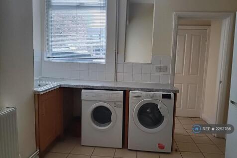 Washing Machine And Dryer In Kitchen