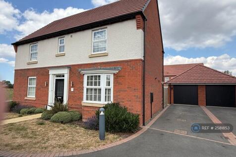 Front Elevation With Single Garage And Drive