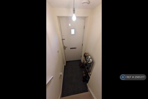 Front Door / Bottom Of Stairs